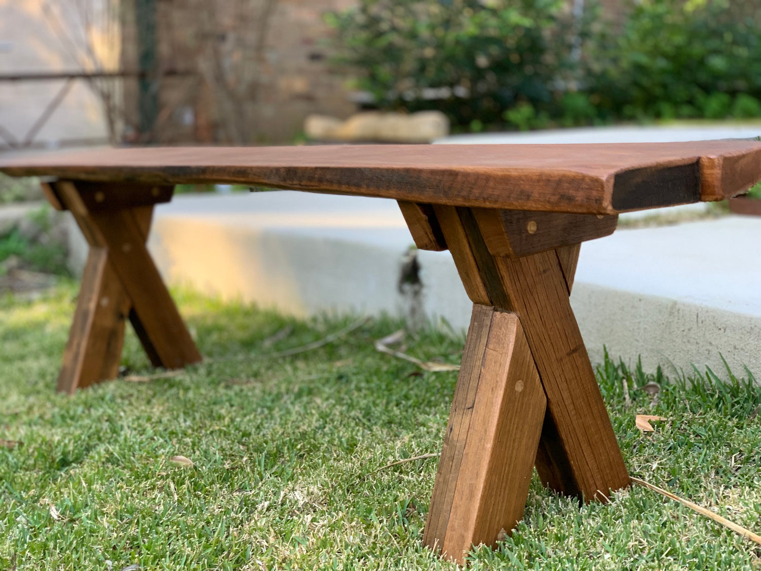 We're a furniture maker and designer who specialise in building tables. Here is a custom bench seat made out of 200 year old reclaimed Australian hardwood.